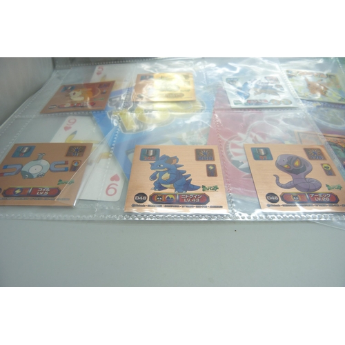 2292 - A collection of Pokémon playing cards, vintage, Pokémon board game cards, Pokémon stickers, Japanese... 