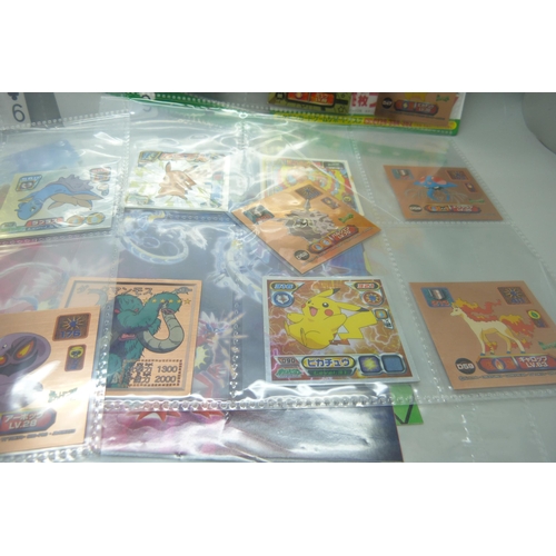 2292 - A collection of Pokémon playing cards, vintage, Pokémon board game cards, Pokémon stickers, Japanese... 
