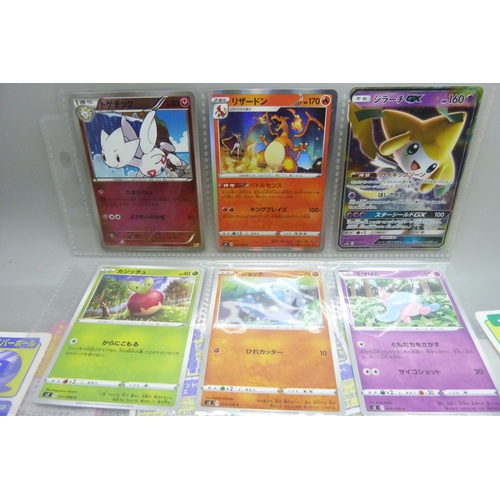 2292 - A collection of Pokémon playing cards, vintage, Pokémon board game cards, Pokémon stickers, Japanese... 