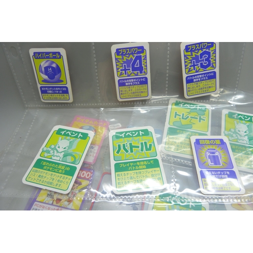 2292 - A collection of Pokémon playing cards, vintage, Pokémon board game cards, Pokémon stickers, Japanese... 