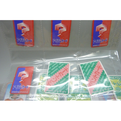2292 - A collection of Pokémon playing cards, vintage, Pokémon board game cards, Pokémon stickers, Japanese... 