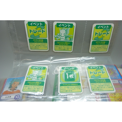 2292 - A collection of Pokémon playing cards, vintage, Pokémon board game cards, Pokémon stickers, Japanese... 