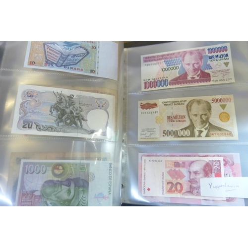 2294 - A collection of British and worldwide banknotes and a Penny black commemorative 50p coin