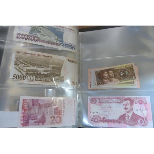 2294 - A collection of British and worldwide banknotes and a Penny black commemorative 50p coin