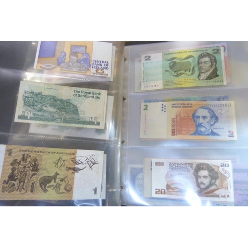 2294 - A collection of British and worldwide banknotes and a Penny black commemorative 50p coin