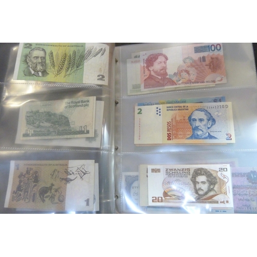 2294 - A collection of British and worldwide banknotes and a Penny black commemorative 50p coin