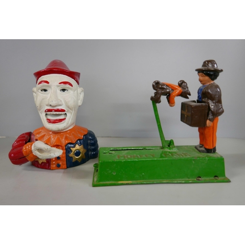 2330 - Two cast metal money boxes including clown