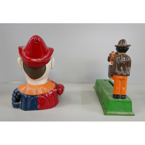 2330 - Two cast metal money boxes including clown