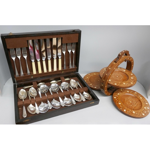 2361 - A collection of cutlery, boxed and empty cutlery boxes, silver plated dressing table set, a wooden a... 