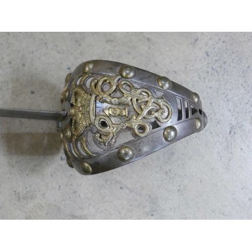 2089 - A 19th Century 1834 pattern 1st Life Guards sword with scabbard, detail on blade worn, 4cm spit on t... 