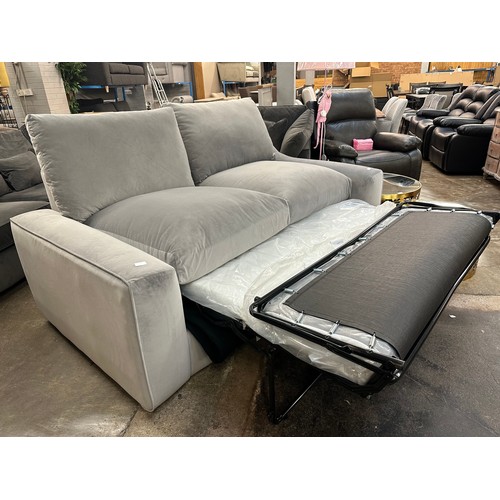 3104 - A pewter velvet upholstered two seater sofa bed