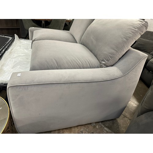 3104 - A pewter velvet upholstered two seater sofa bed