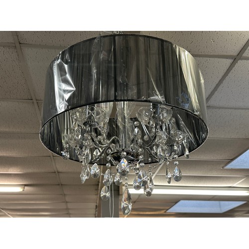 3106 - A chrome five arm chandelier with black shade