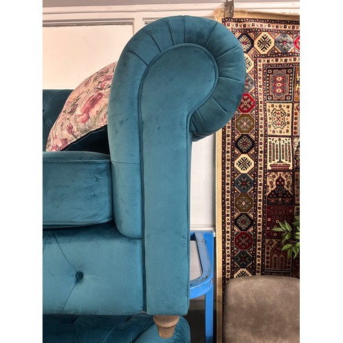 3019 - A turquoise Chesterfield three seater sofa