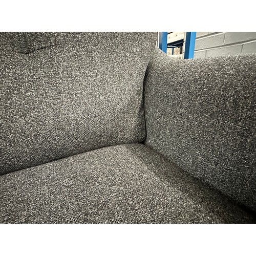 3115 - A dark static grey upholstered compact two seater sofa on turned oak legs