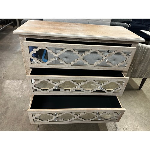 3117 - A three drawer mirrored front lattice chest