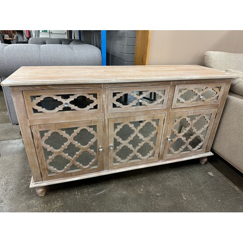 3118 - A 140cm wooden and mirrored front lattice sideboard