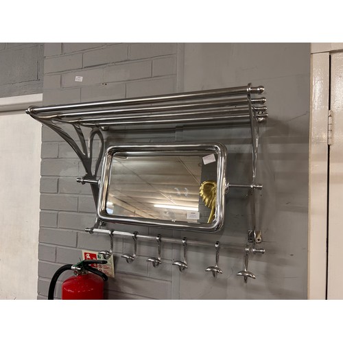 3064 - A chrome wall mounted luggage rack