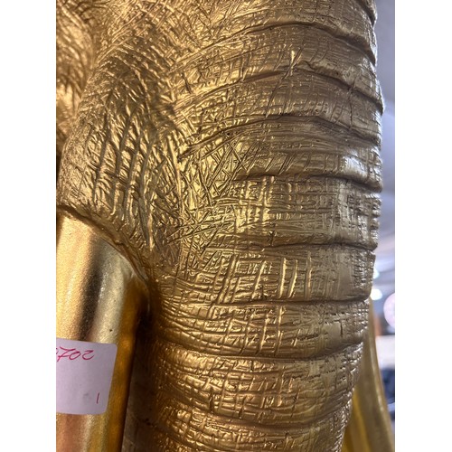 3067 - A large gold bust of an elephant