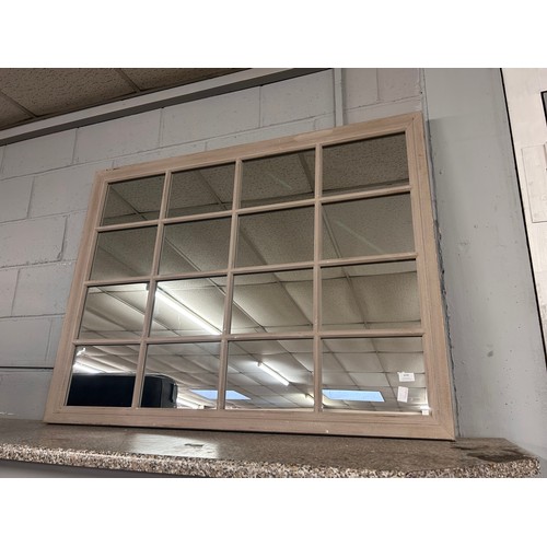 3090 - A large sixteen pane mirror