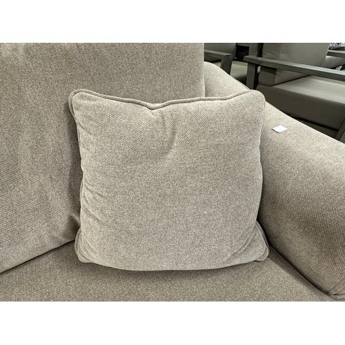 3147 - A beech beige upholstered 2.5 seater sofa on light oak legs, tear to inside of cushion