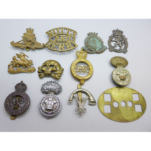 2028 - A collection of military badges, including Royal Horse Guards, Notts & Derby and Princess Charlotte ... 