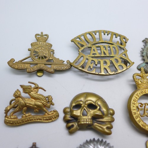 2028 - A collection of military badges, including Royal Horse Guards, Notts & Derby and Princess Charlotte ... 