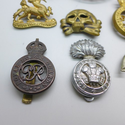 2028 - A collection of military badges, including Royal Horse Guards, Notts & Derby and Princess Charlotte ... 