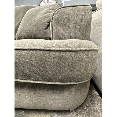 3145 - An olive green upholstered love seat and footstool on smoked oak legs