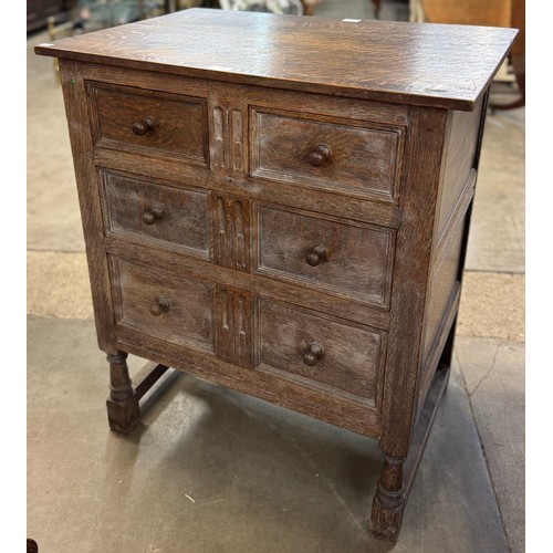 182 - An early 20th Century Jacobean Revival oak chest of drawers