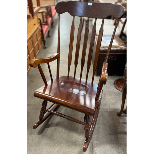 187 - An early 20th Century mahogany rocking chair