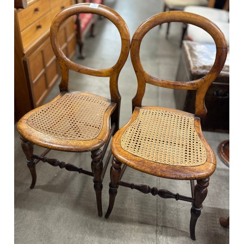 188 - A pair of Victorian mahogany bergere balloon back bedroom chairs