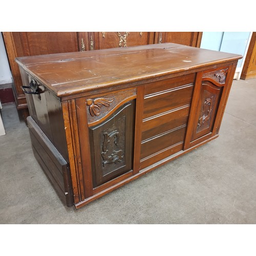 191A - A carved walnut blanket chest