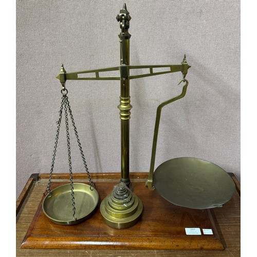 237 - A set of Victorian mahogany and brass weighing scales and a set of graduated brass weights