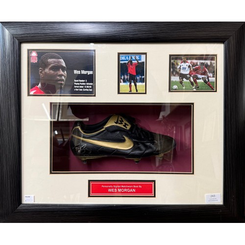 243 - A matchworn and signed football boot, worn by Wes Morgan, in framed display