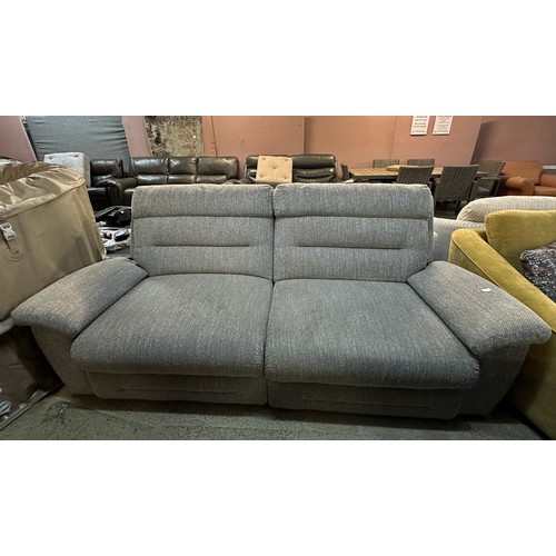 3199 - A grey textured weave upholstered electric reclining three seater sofa