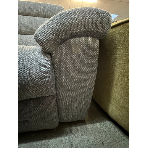 3199 - A grey textured weave upholstered electric reclining three seater sofa