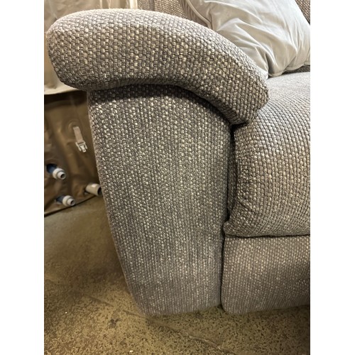 3200 - A grey textured weave upholstered electric reclining armchair