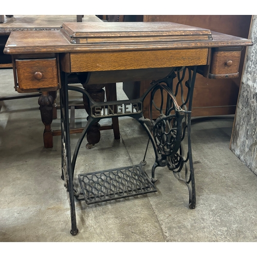 206A - An oak and cast iron Singer sewing machine