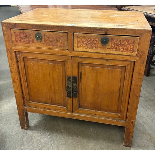 178 - A 19th Century Chinese carved hardwood two door cabinet