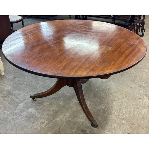 180 - A George III mahogany tilt top tripod breakfast table