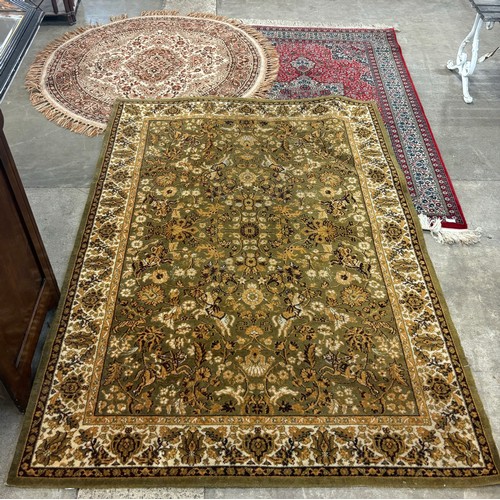 173 - Three assorted rugs, 139 x 198cms, 124 x 188cms and 130cms