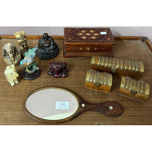 262 - A quantity of assorted treen, a Victorian rosewood mirror, Egyptian resin figures, etc.