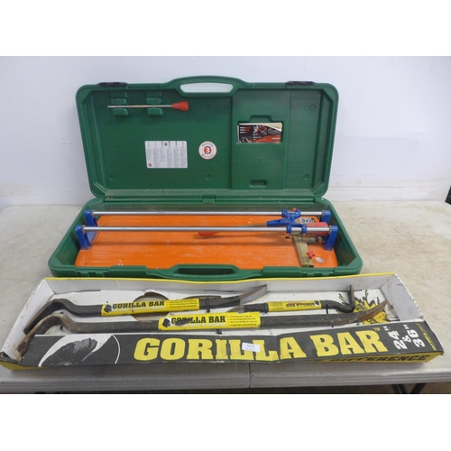 5014 - A Rubi TS-60 industrial tile cutter and a Gorilla Bar box set - 24” 36” and Gorilla Bar Junior