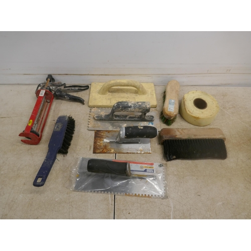 5024 - A large quantity of assorted tools and other items including trowels, pasting brushes, sealant guns,... 