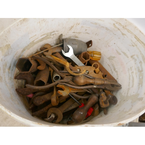 5031 - Two buckets of assorted hand tools, a part roll of mesh fencing and a cast metal shelf