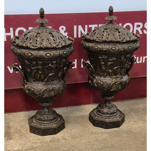 270A - A pair of large Baroque Revival cast bronze urns and covers