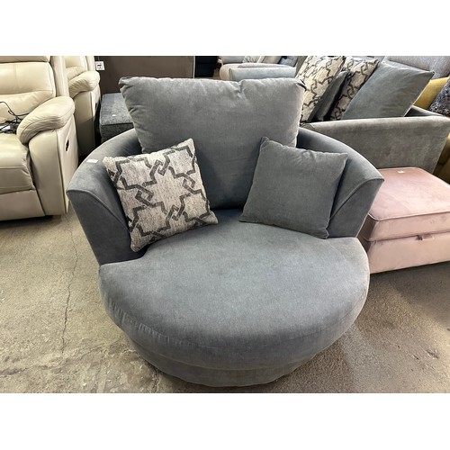 3205 - A charcoal upholstered swivel chair