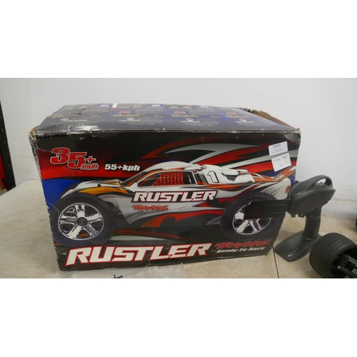 5059 - A Rustler Traxxas ready to race 35mph+ remote control car, in box