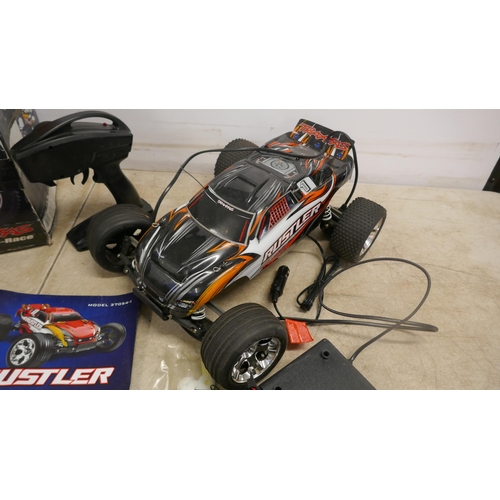 5059 - A Rustler Traxxas ready to race 35mph+ remote control car, in box